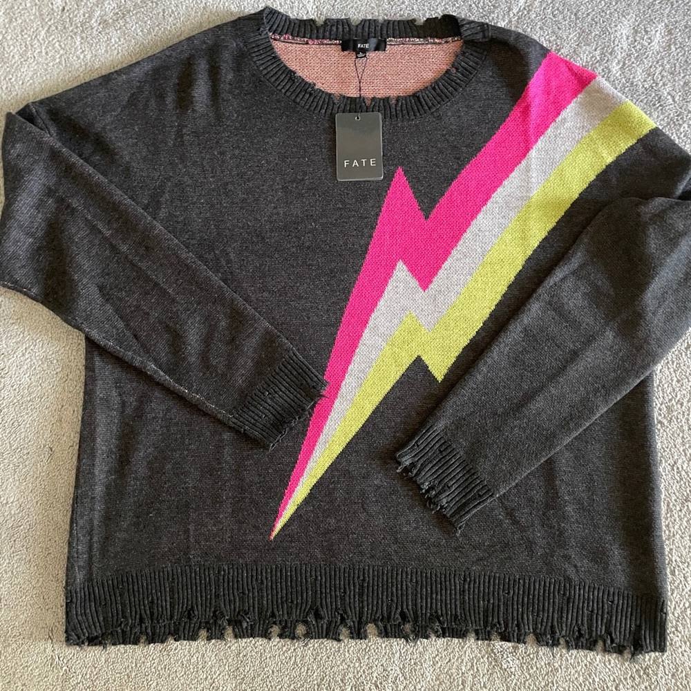 Lightening bolt distressed sweater